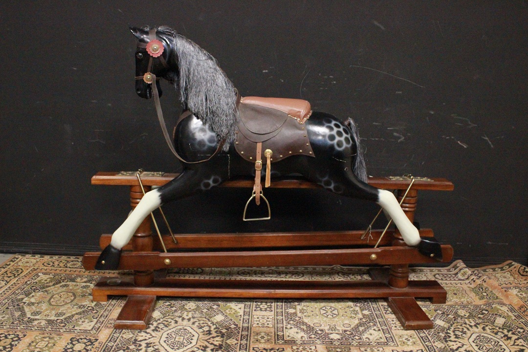 Cavalli a dondolo legno