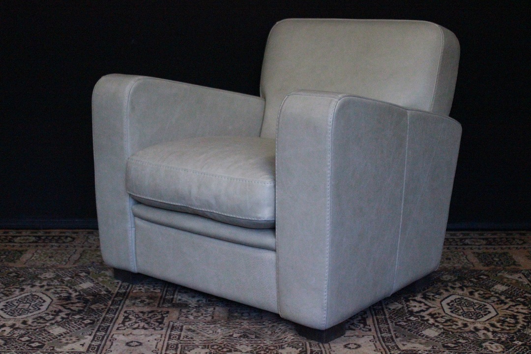 639_poltrona_armchair_design_leather_pelle_avorio_ivory_tessuto_dopo_2000_italia_italy_1